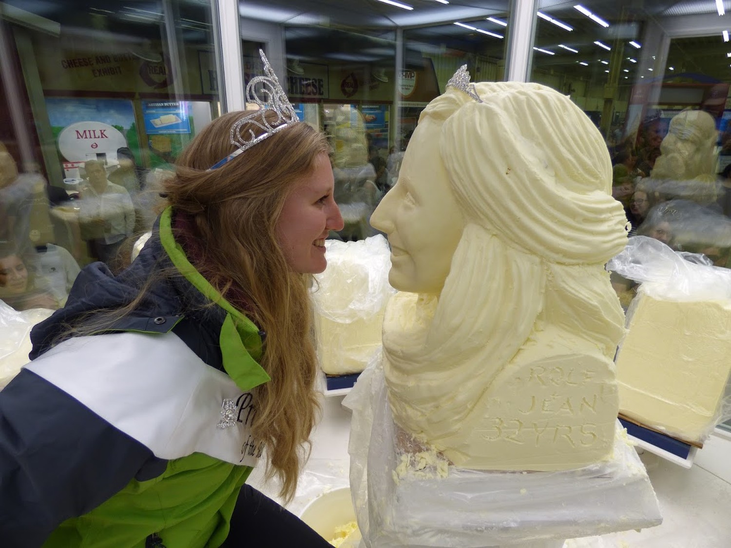 Emily Annexstad looking at her butter sculpture